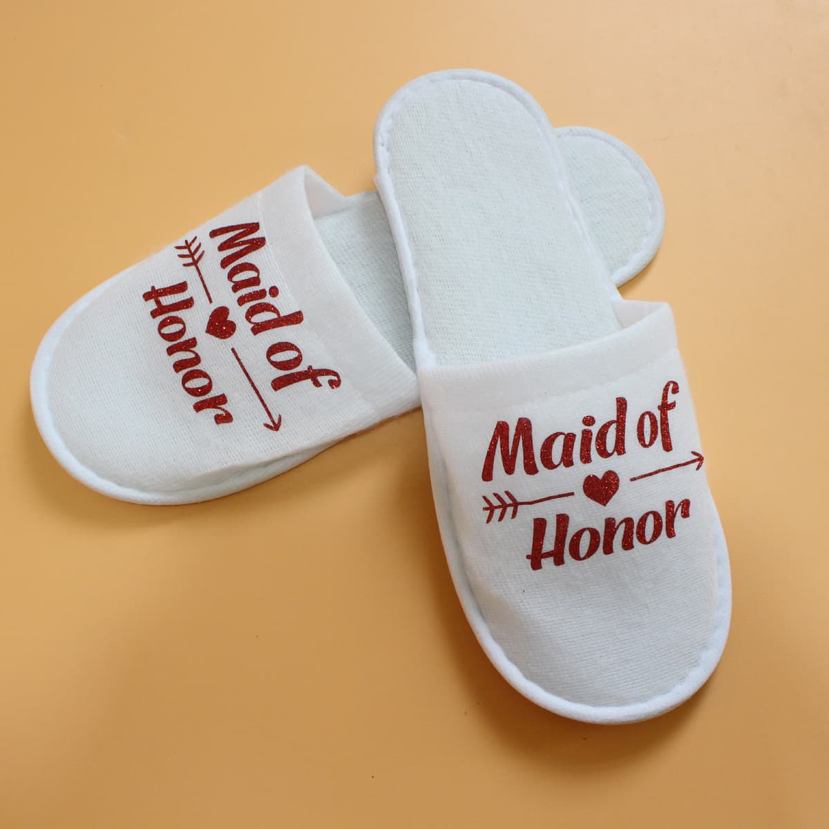 White slippers/red letters maid of honor