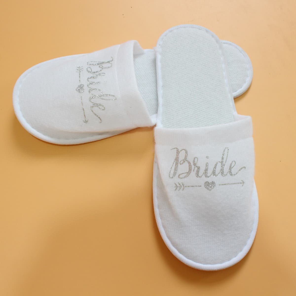 White slippers/silver letters bride