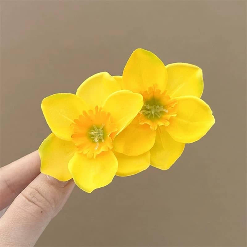 Bright yellow twin flower hairpin