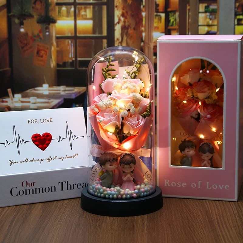[7 light pink roses + colorful balls + couple dolls (finished product)