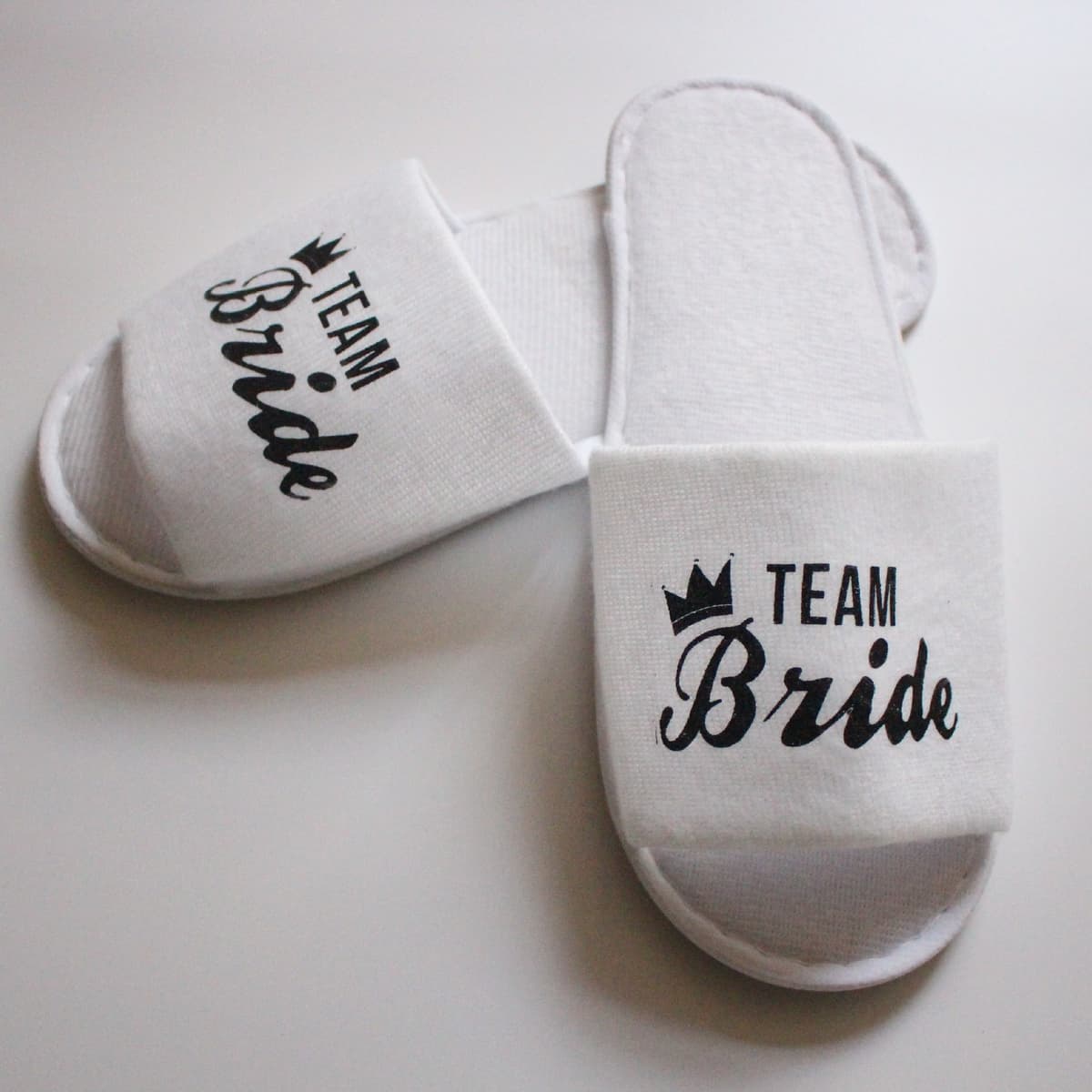 White Slippers/Black Crown Letter team bride