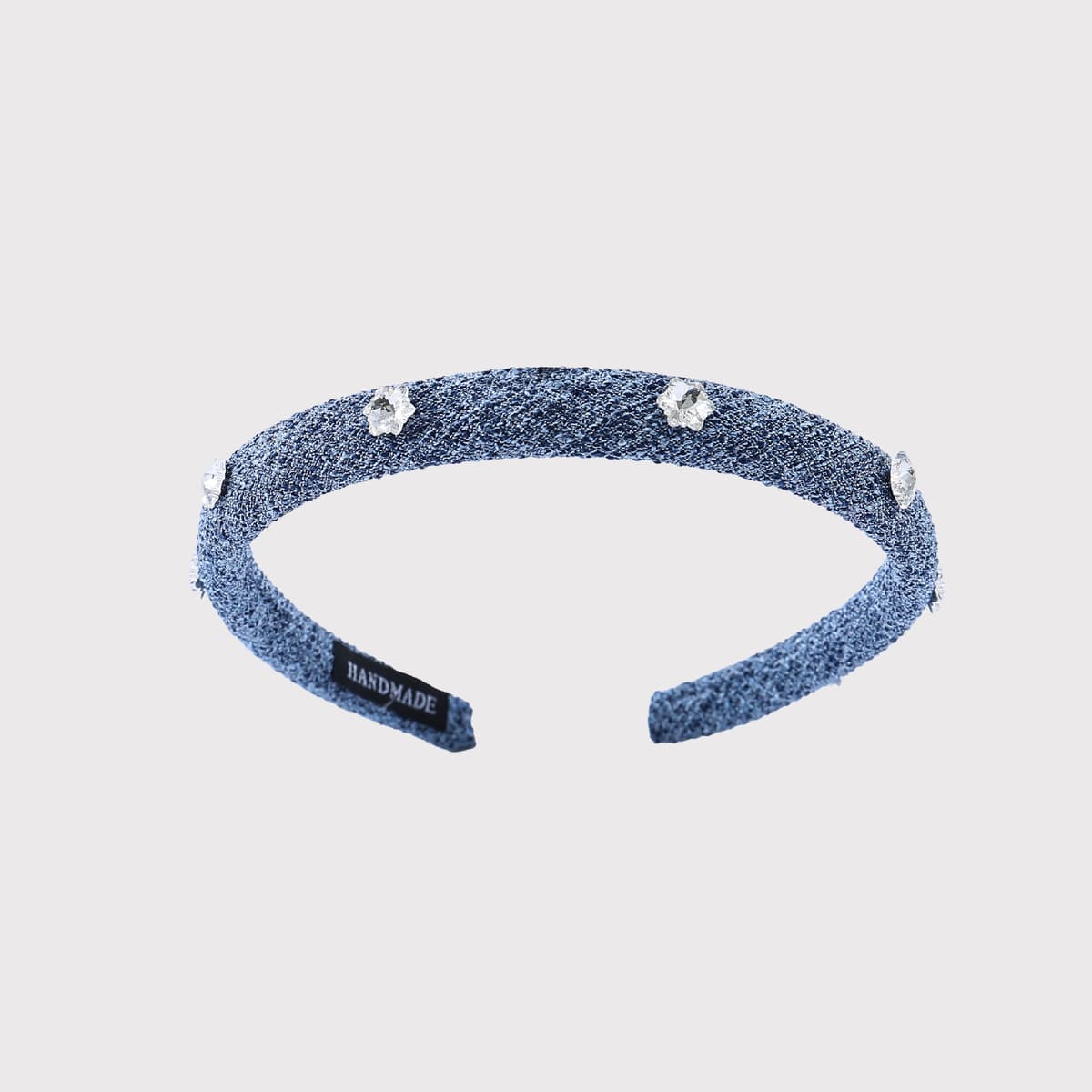 Blue inlaid with white snowflake diamonds - very shiny in person