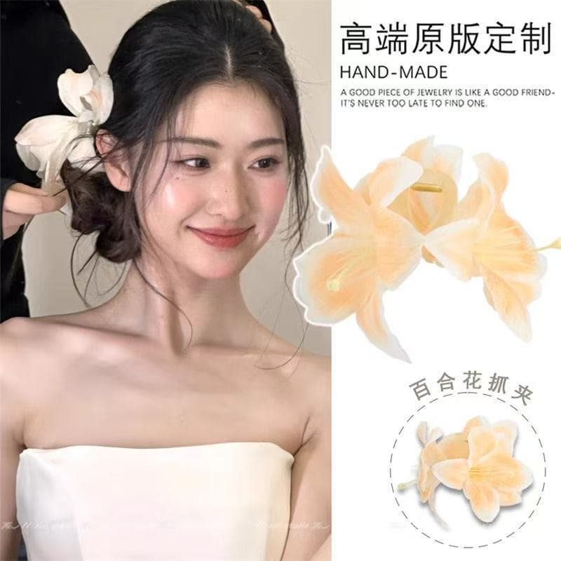 5596 asymmetric lily clip-orange