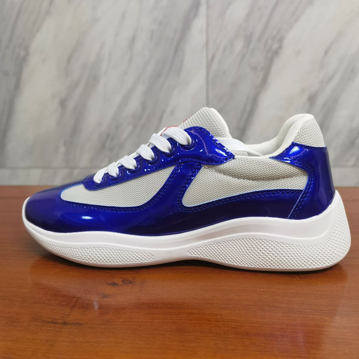 Yun prada blue glossy surface