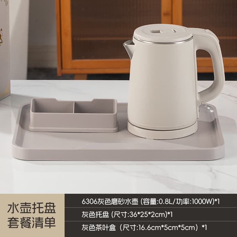 Gray teapot with tea infuser tray