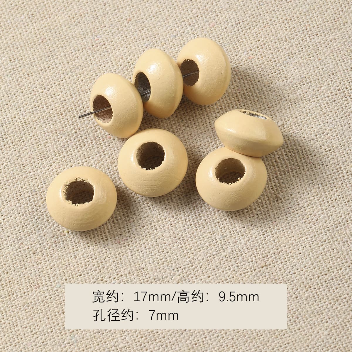 1 white wooden bead flying saucer