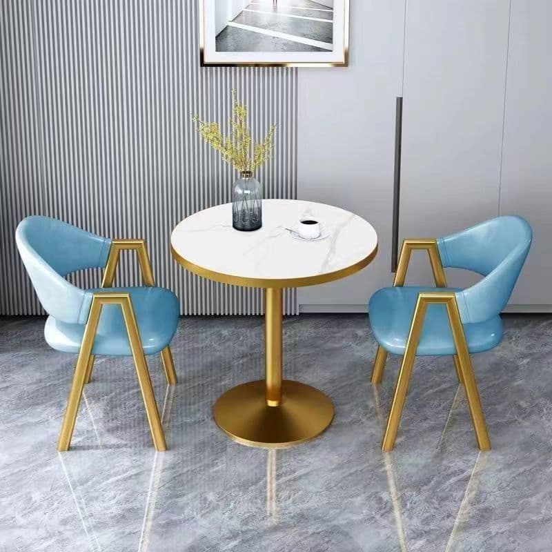 Imitation white marble table top + light blue leather chair