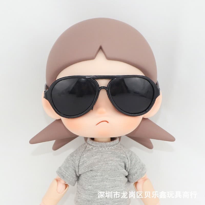 C123 black sunglasses model a