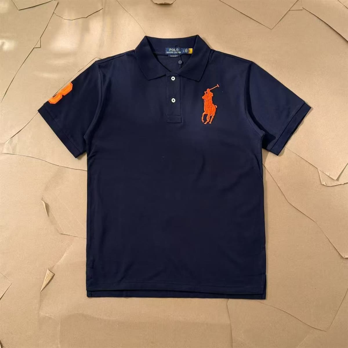 Navy blue orange label
