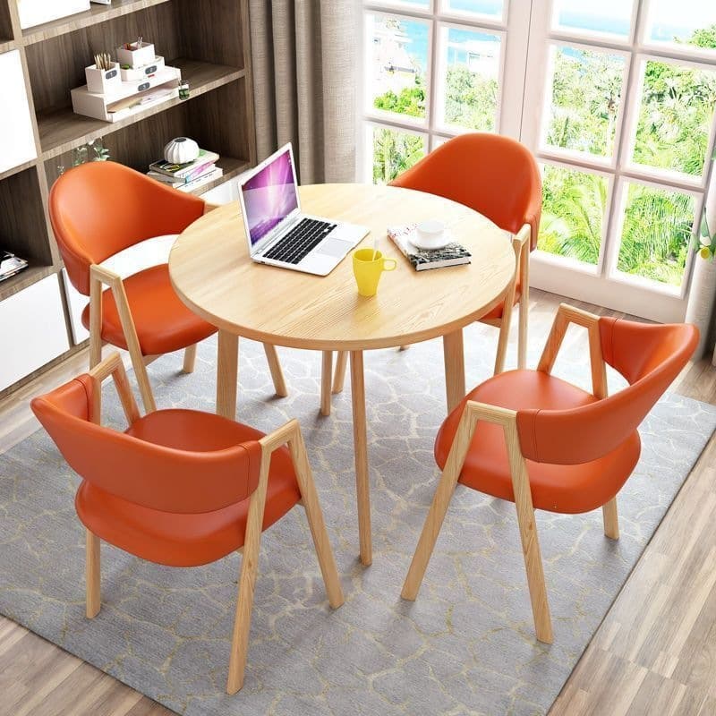 Light wood grain single table + orange leather chair