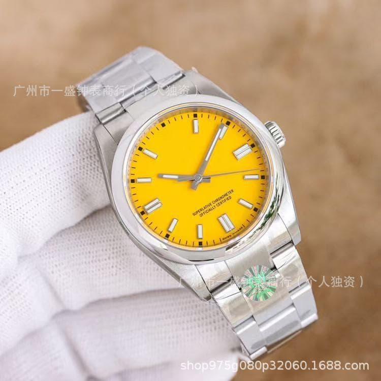 Stainless steel with yellow dial