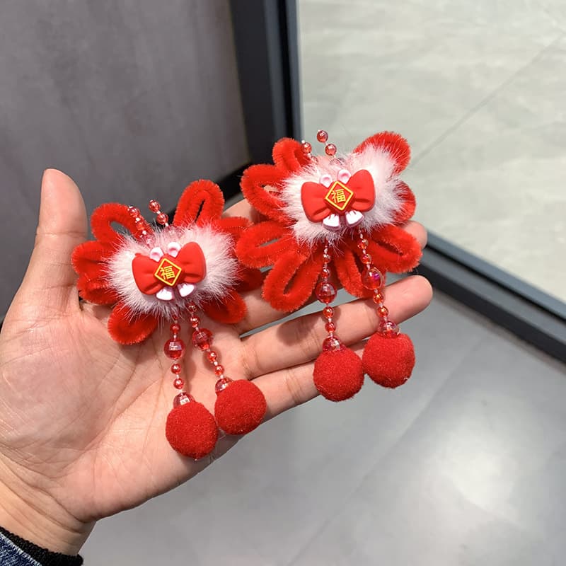 Children's red blessing solanum clip