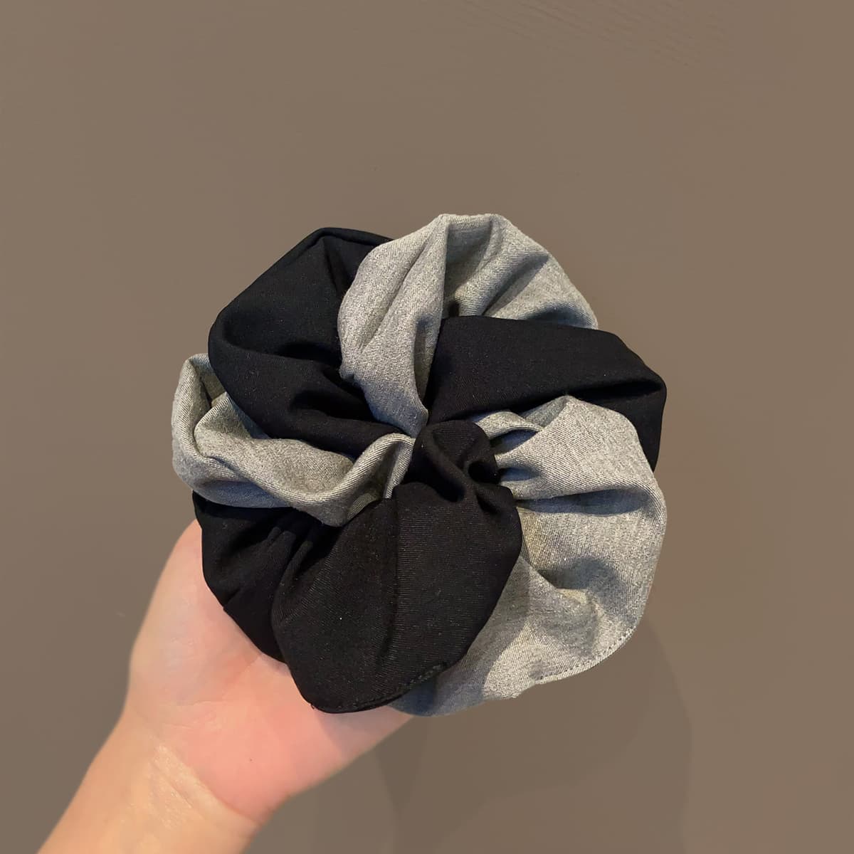 Black and gray hair tie