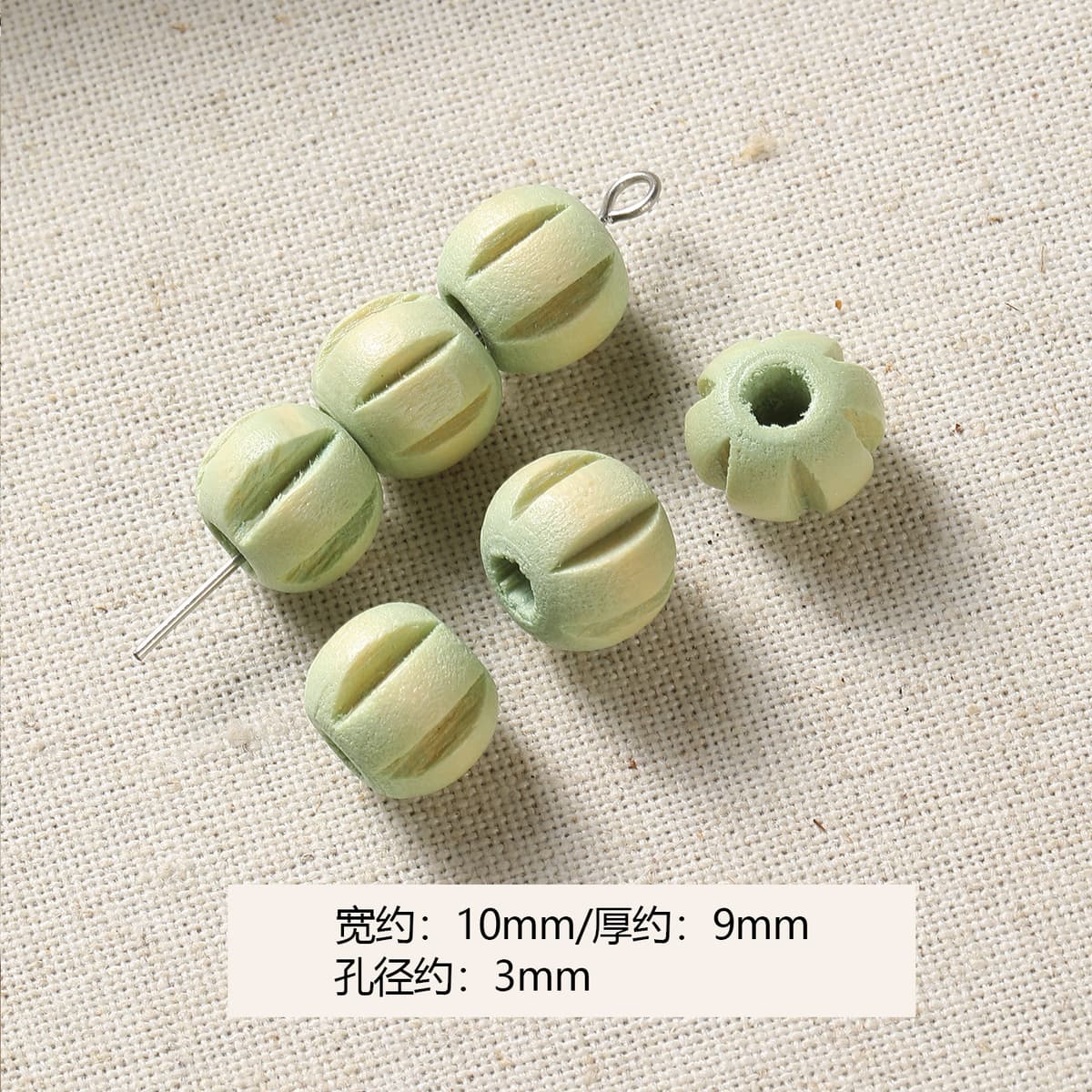 1 green pumpkin bead