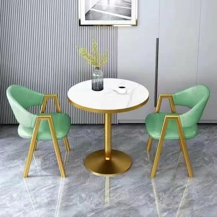 Imitation white marble table top + mo green leather chair