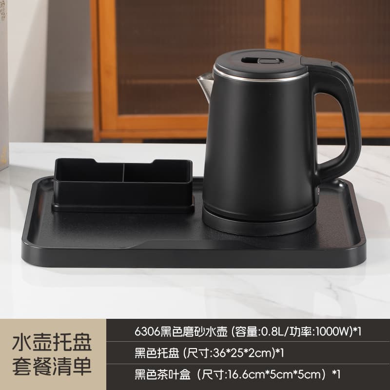 Black teapot with tea strainer tray