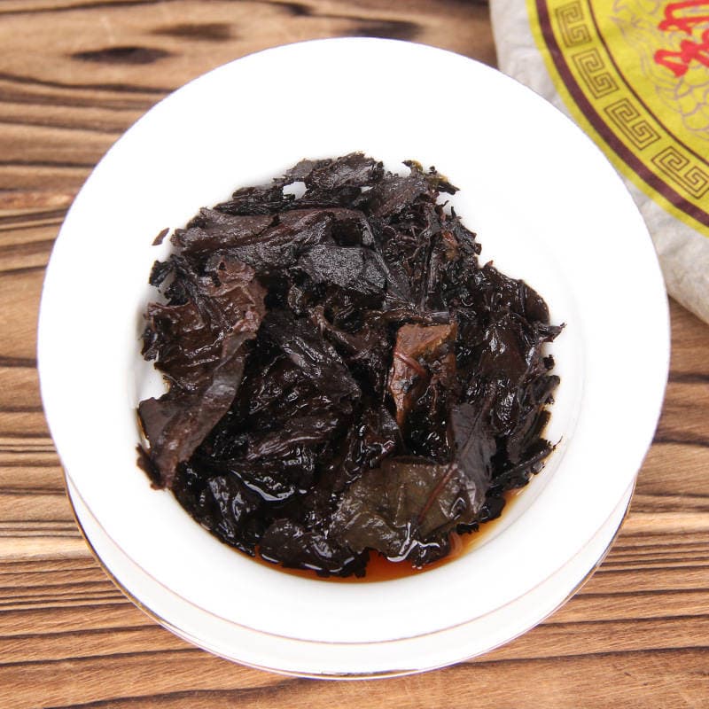 Menghai quru anbarından köhnə Pu-er çayı, Qizi tortu, 357 q, bişmiş 4