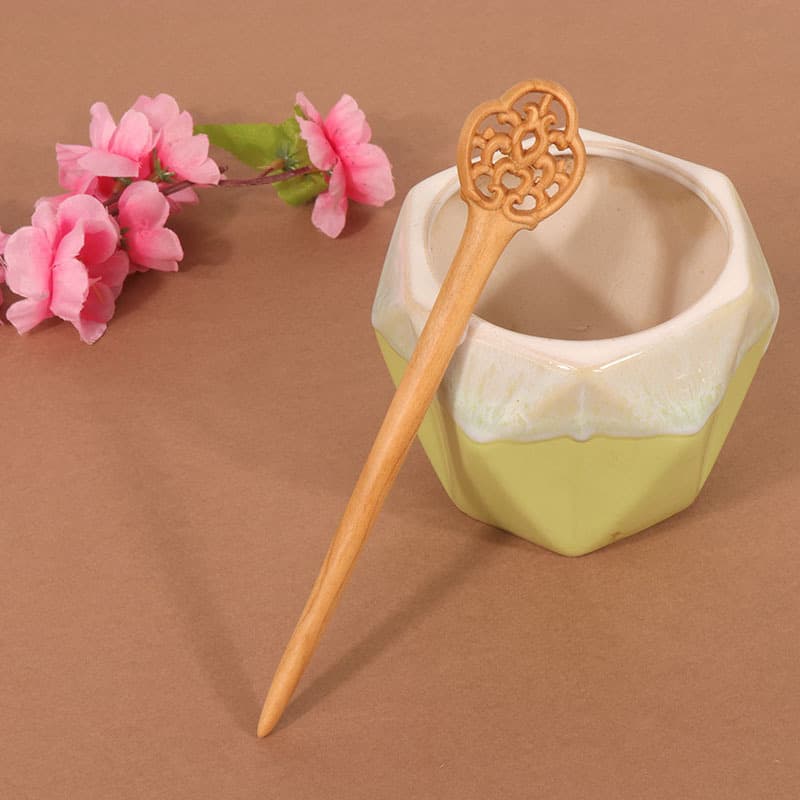Double-sided carved mahogany hairpin-vase