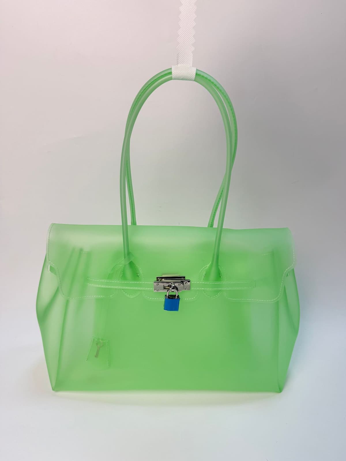 Tpu mint green (with key + rivets on the bottom)