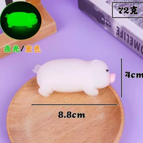 Jumbo glow-in-the-dark color-changing roasted pig