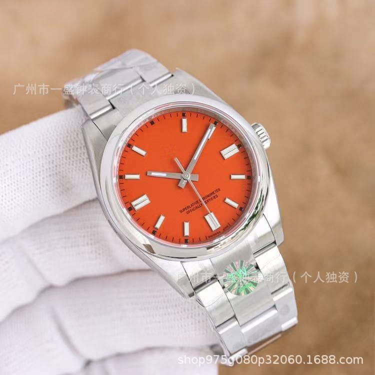 Stainless steel with red dial