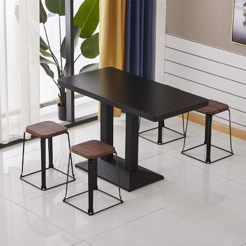 Black embossed table and four stools