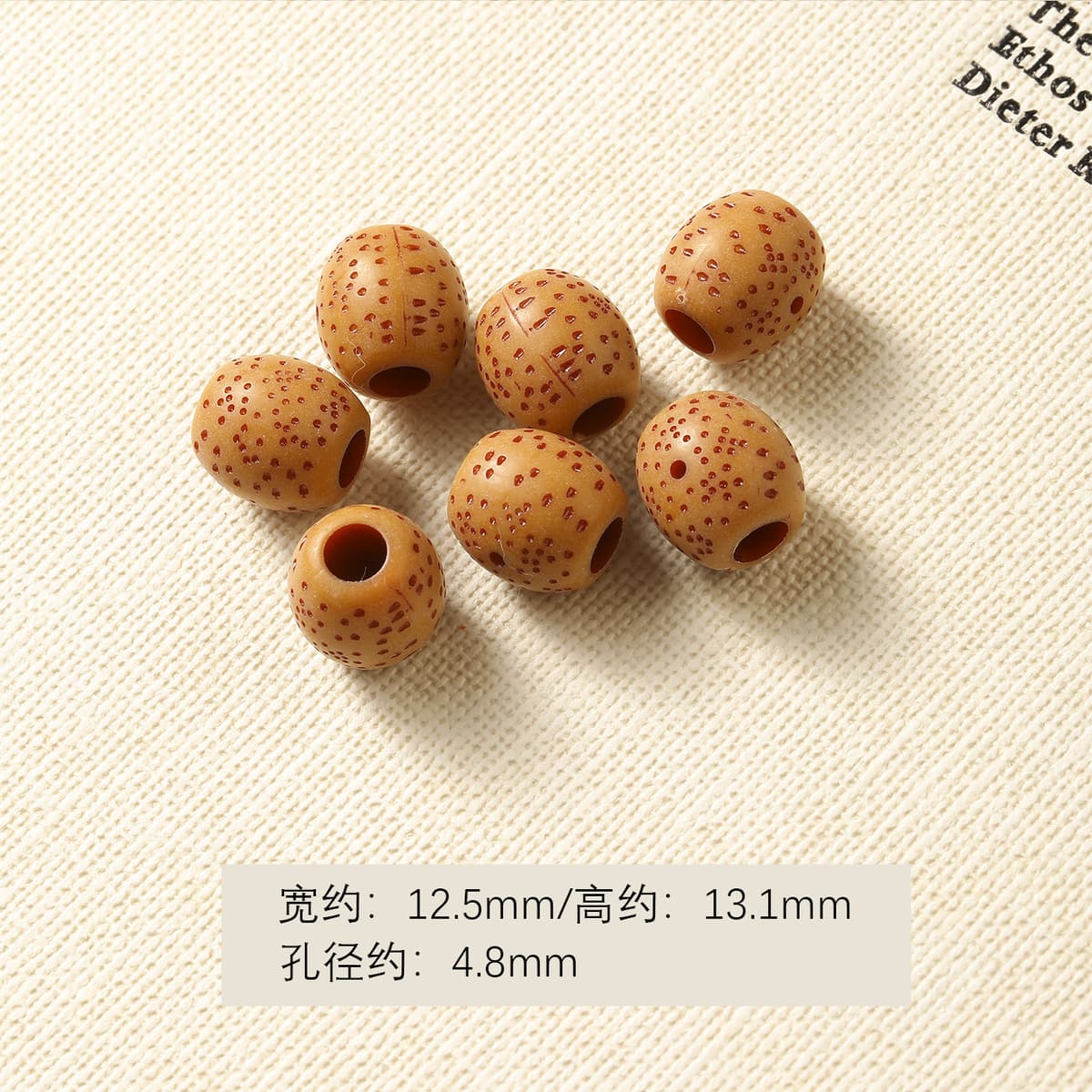 1 pitted barrel bead