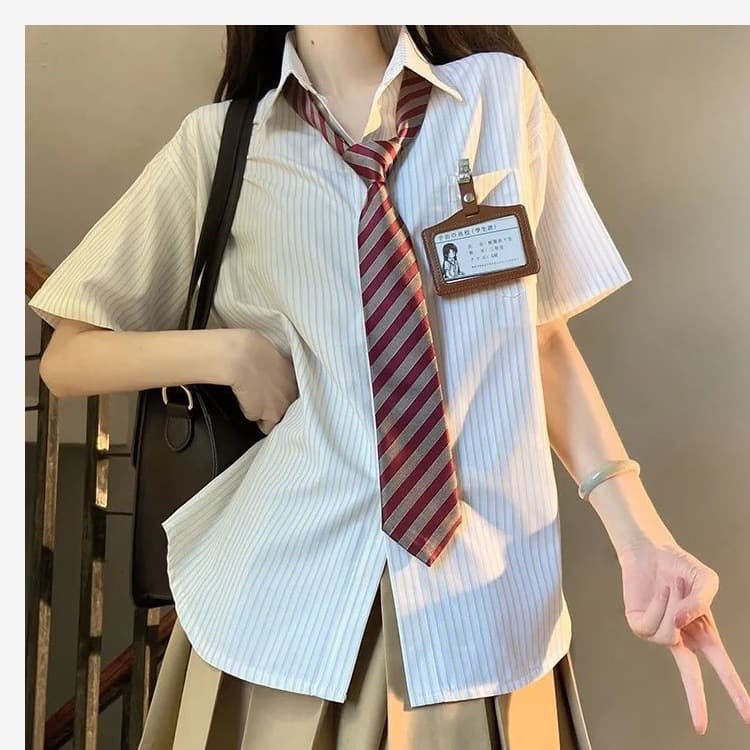 Yellow striped shirt + red striped tie