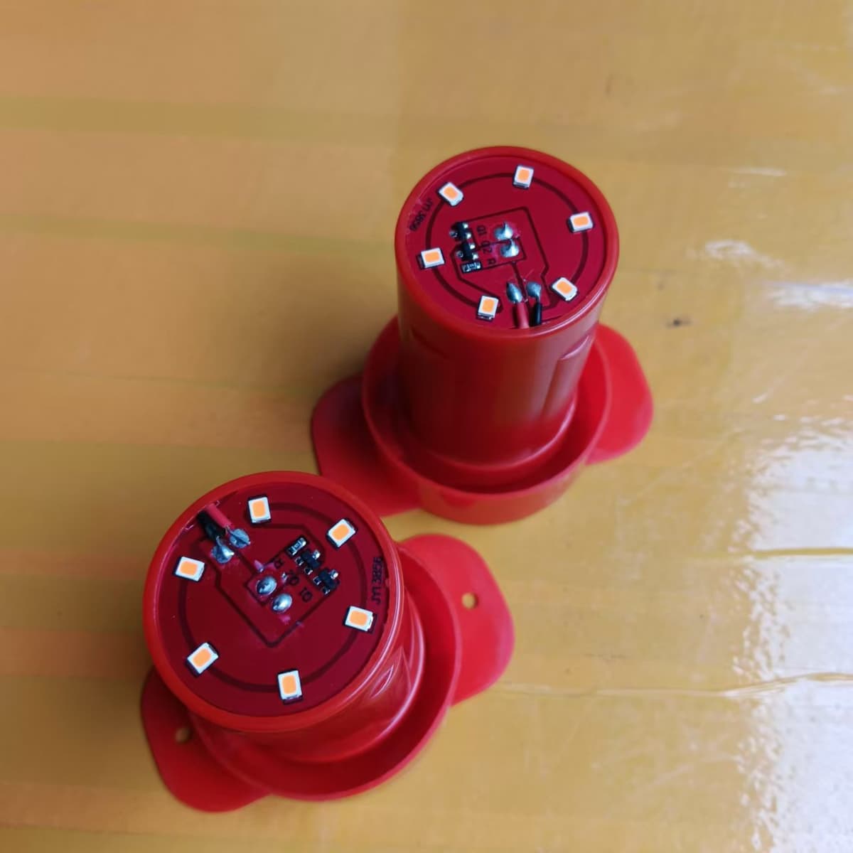 A pair of sensor lights [automatically light up when it gets dark] with their own batteries
