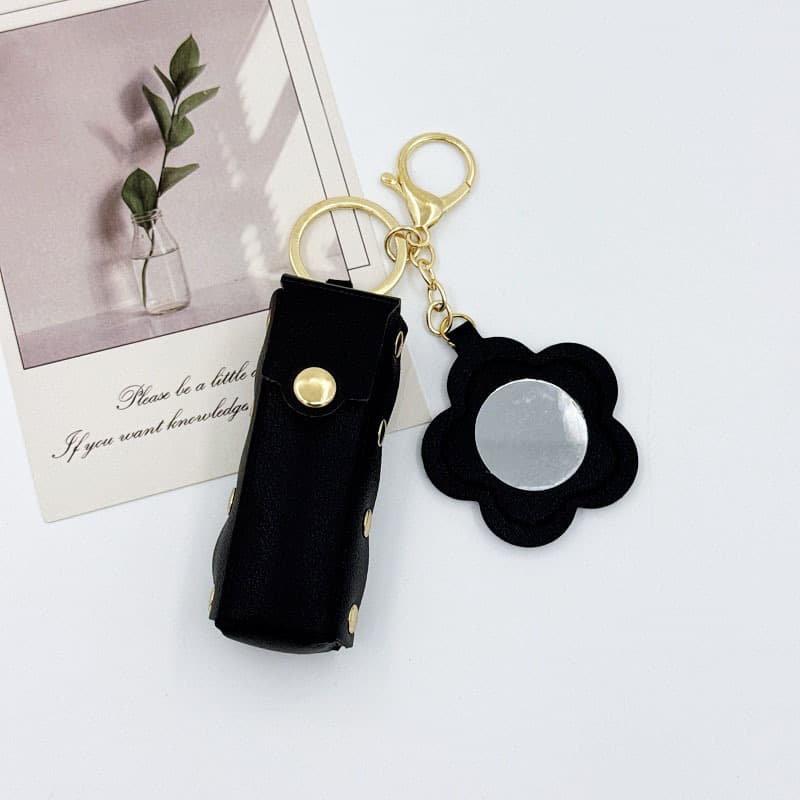 Rivet flower style lipstick bag [black]