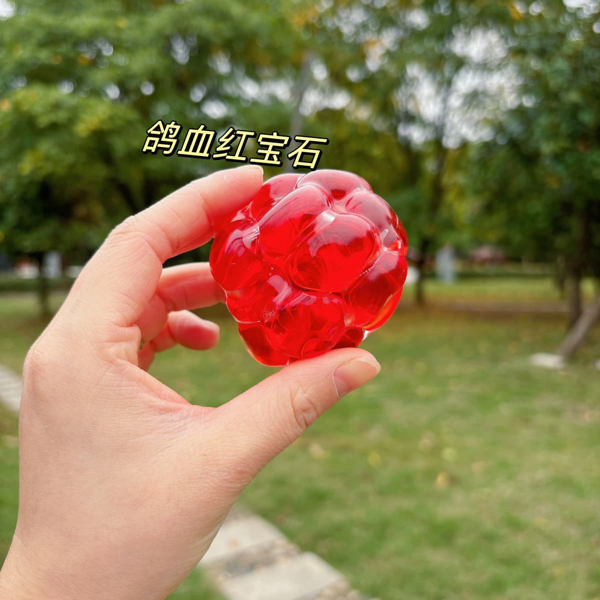 6.0 ruby red rattle ball