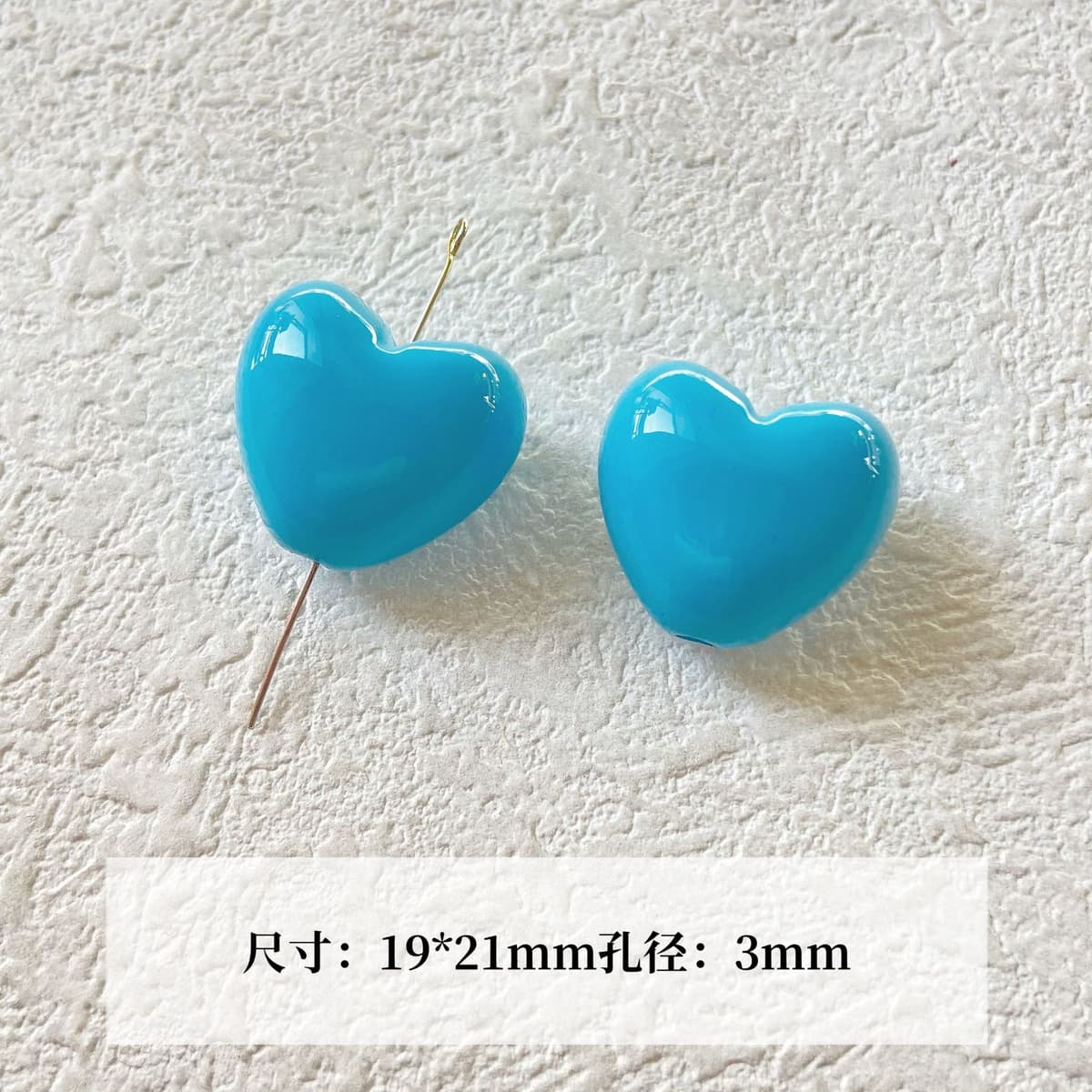 25 pieces of aqua blue heart charms (single)