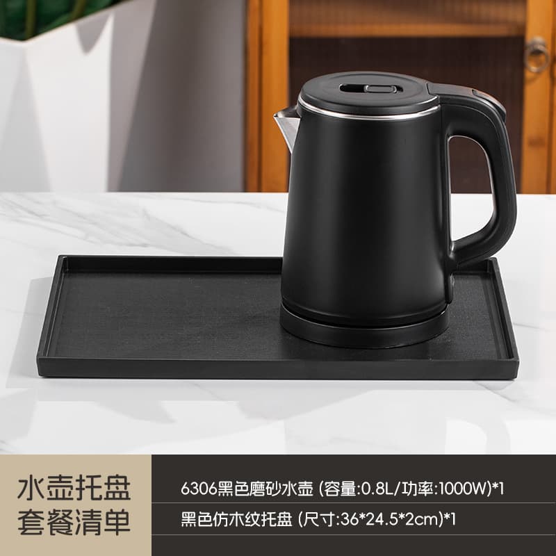 Black teapot with wood grain tray