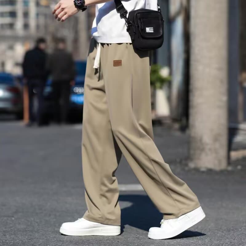 Leather label four-sided stretch pants apricot color
