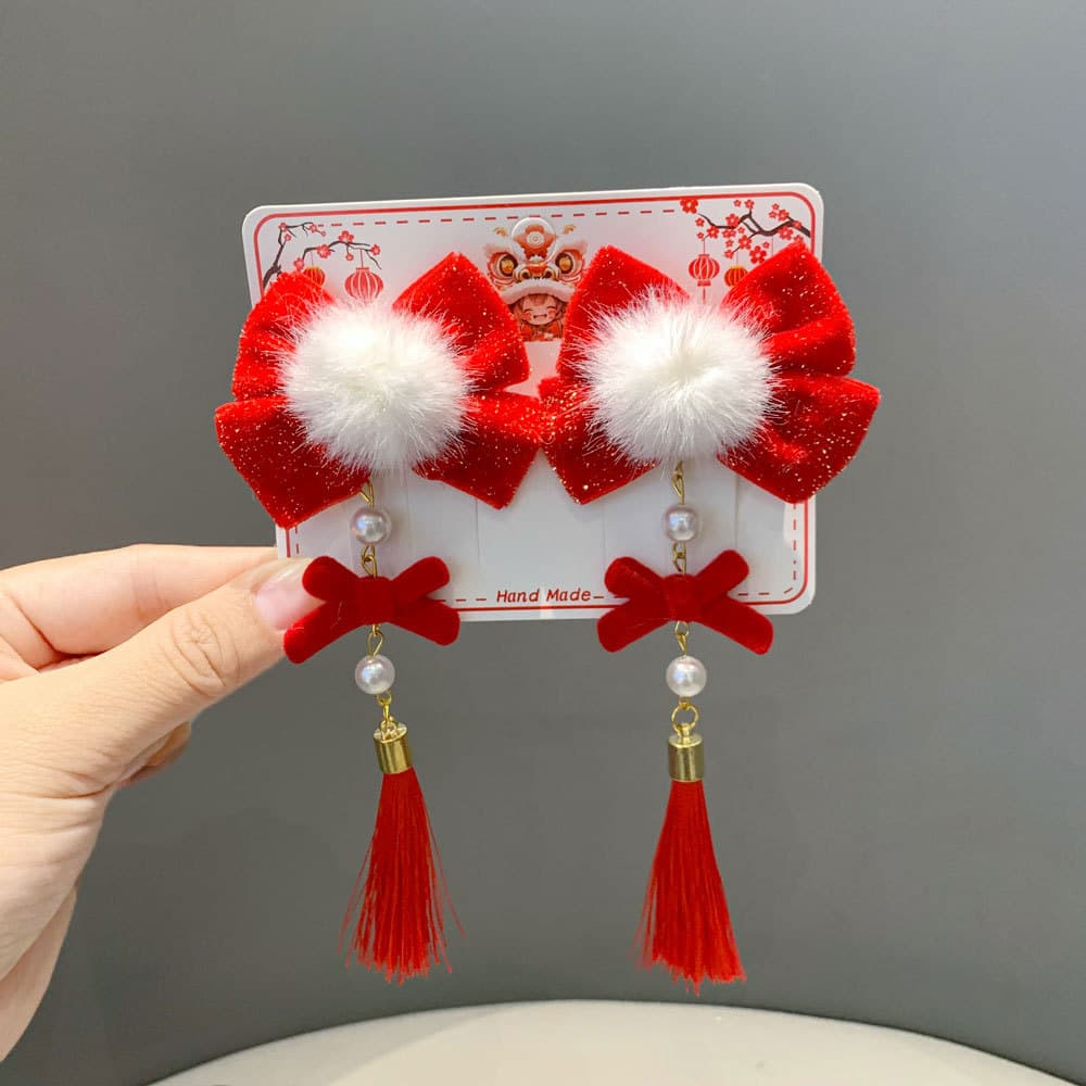 Fur ball bow pearl tassel clip