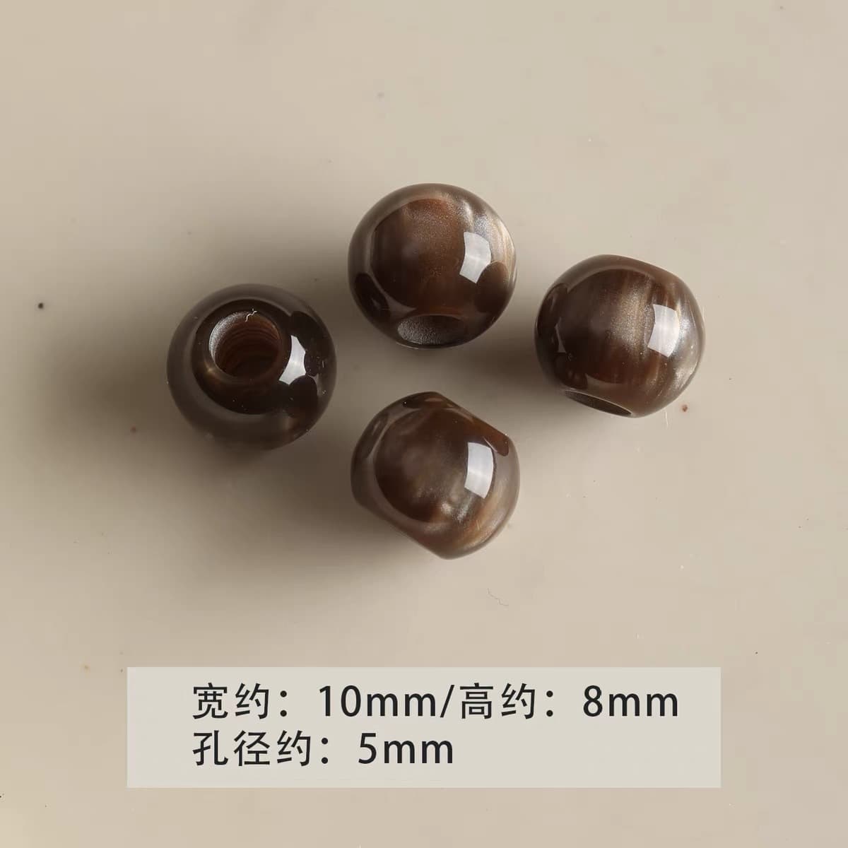1 large hole brown round bead