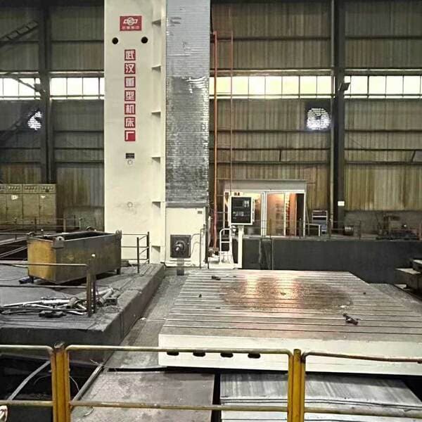 Transfer of Used Wuhan Heavy Industry Tk6920Ax100-50 Cnc Vertical Boring and Milling Machine with W-Axis Travel Distance of 1.2m