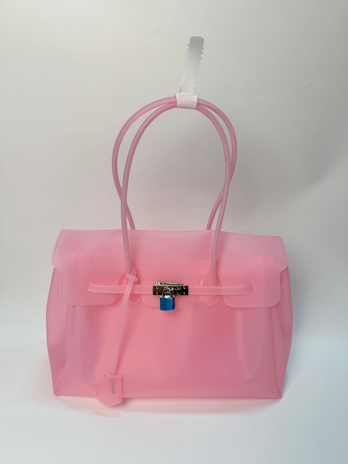 Tpu cherry blossom pink (with key + rivets on the bottom)