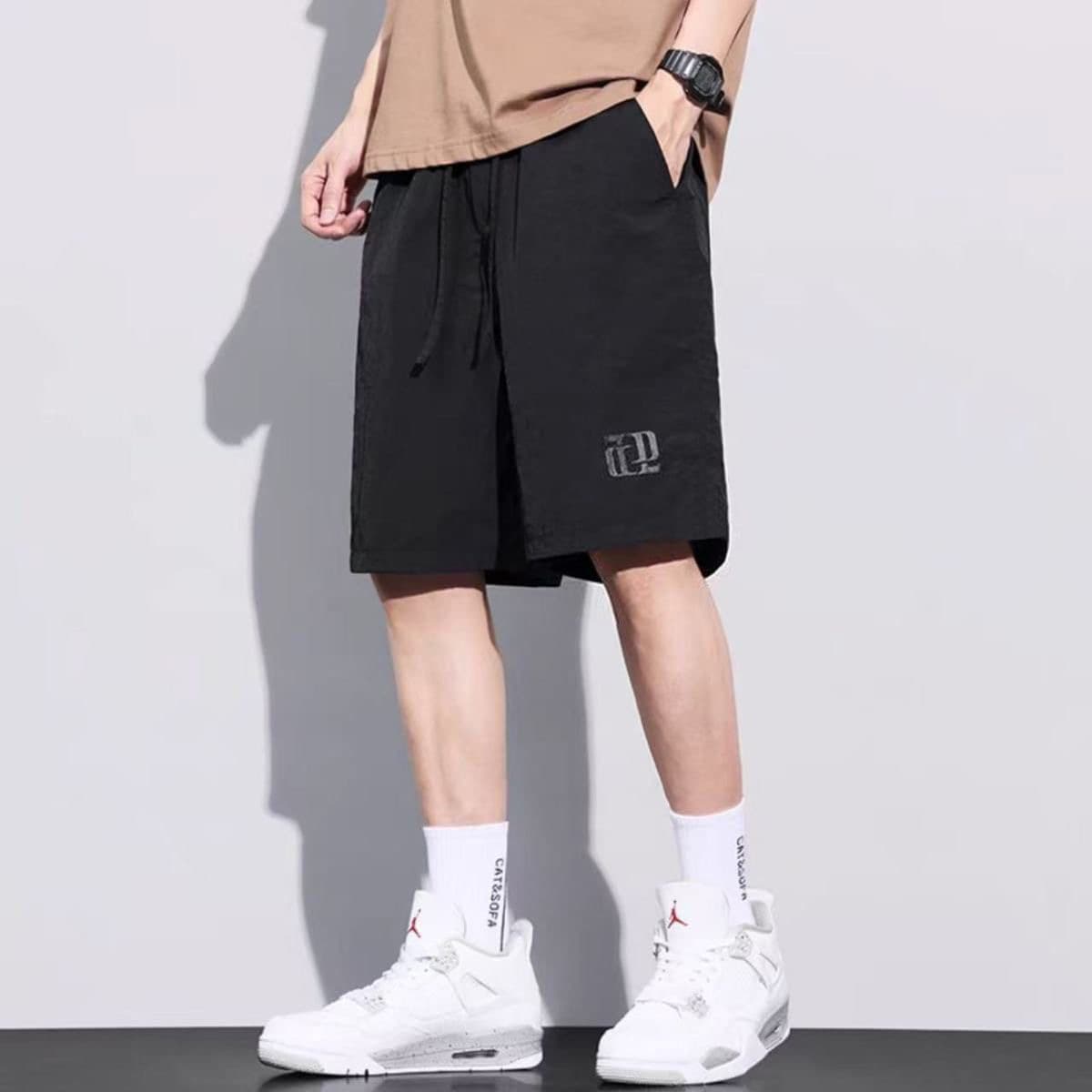 X43 five-quarter pants: black