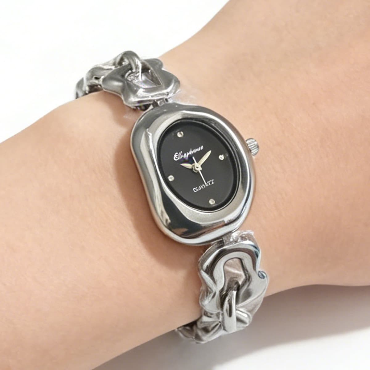 Silver shell black surface