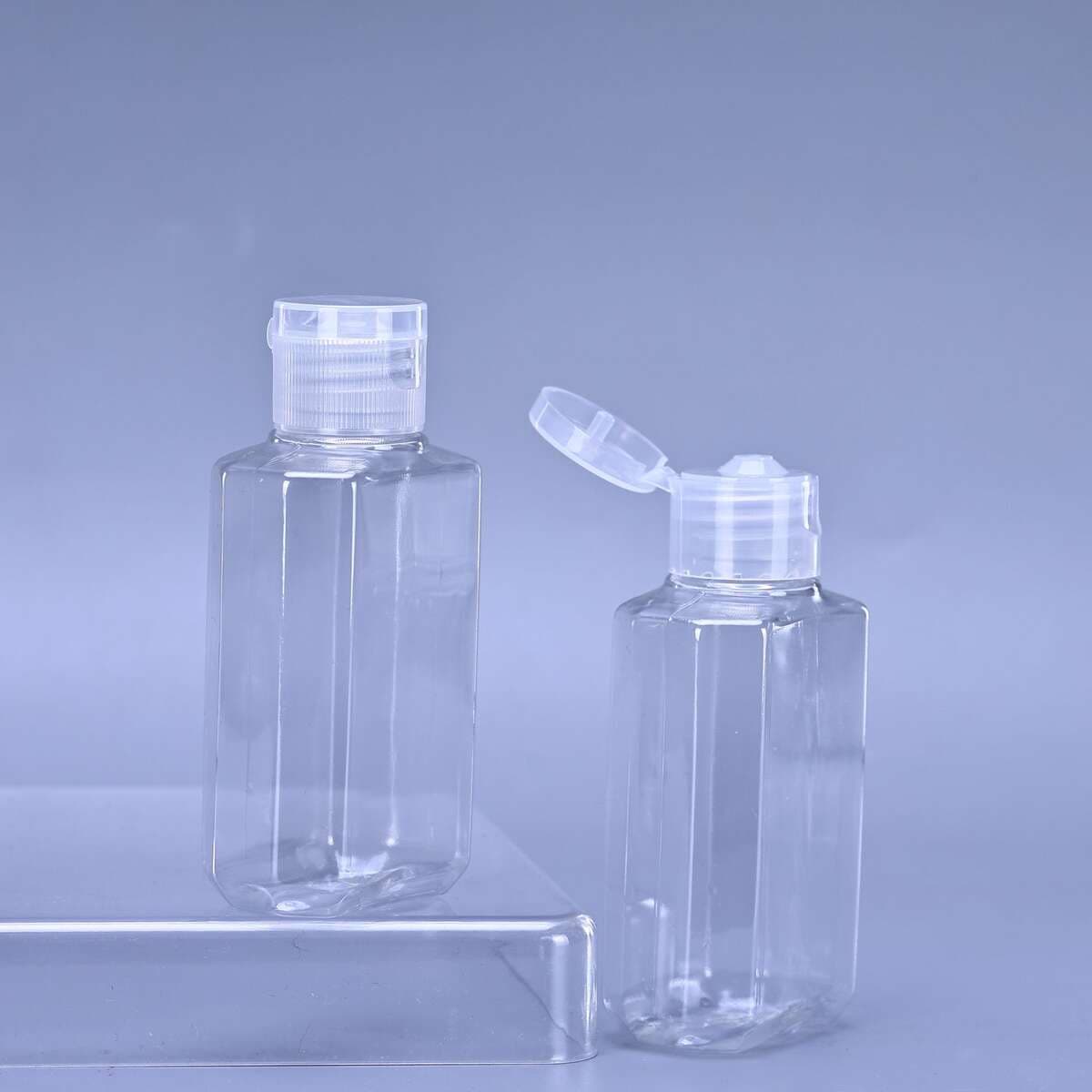 50-60 ml qapaqlı şəffaf PET plastik şüşələr, losyon, su emulsiyası və kosmetika üçün 1