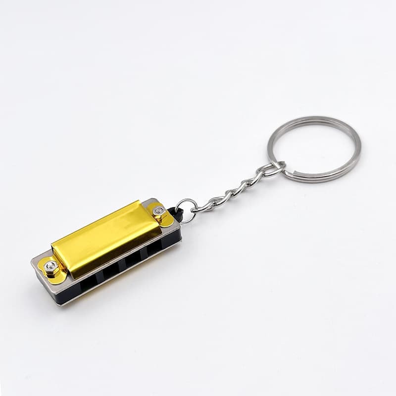 Mini metal harmonica (gold) hanging ring style