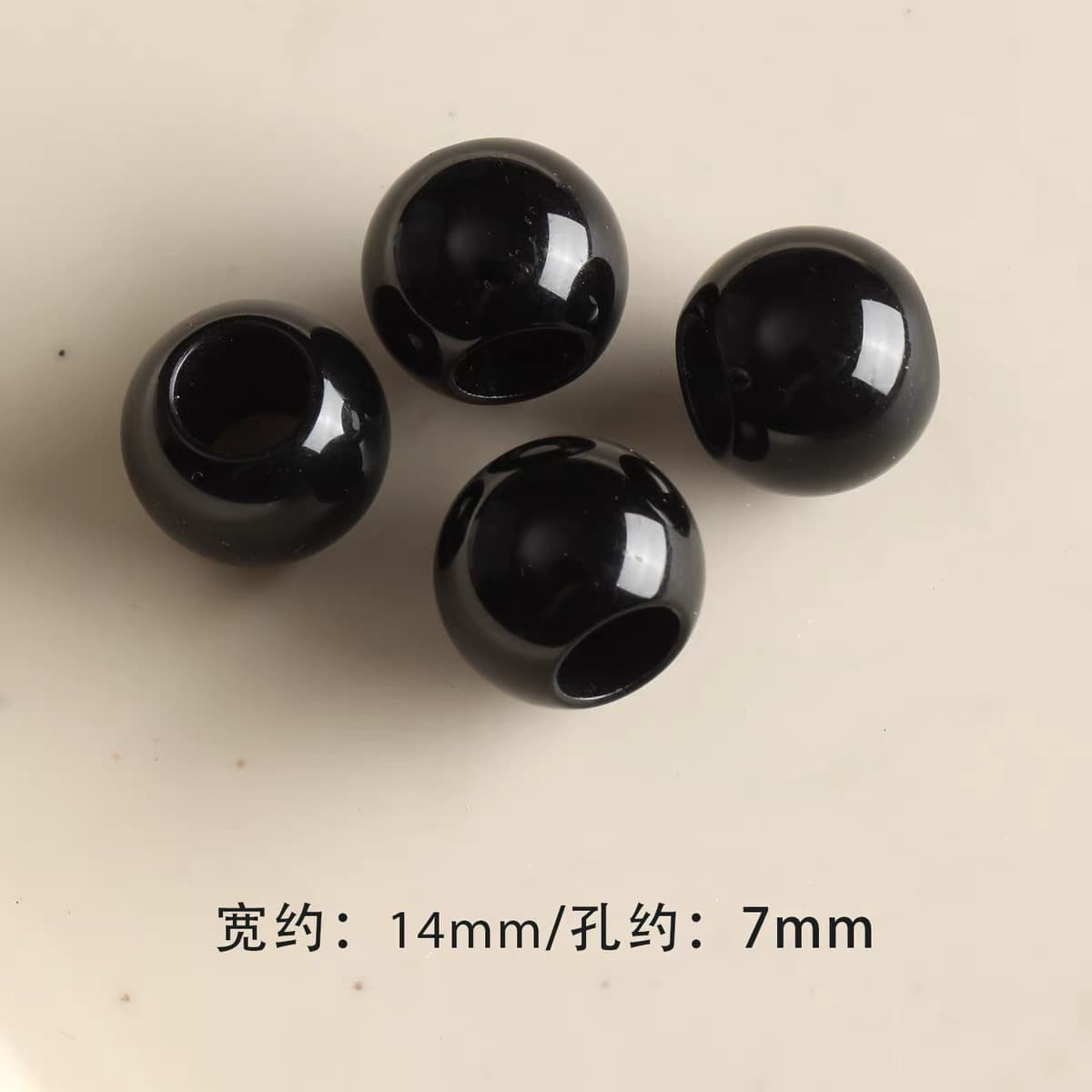1 large hole black round bead
