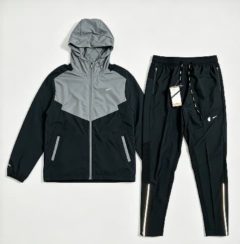 Black and gray top + black pants