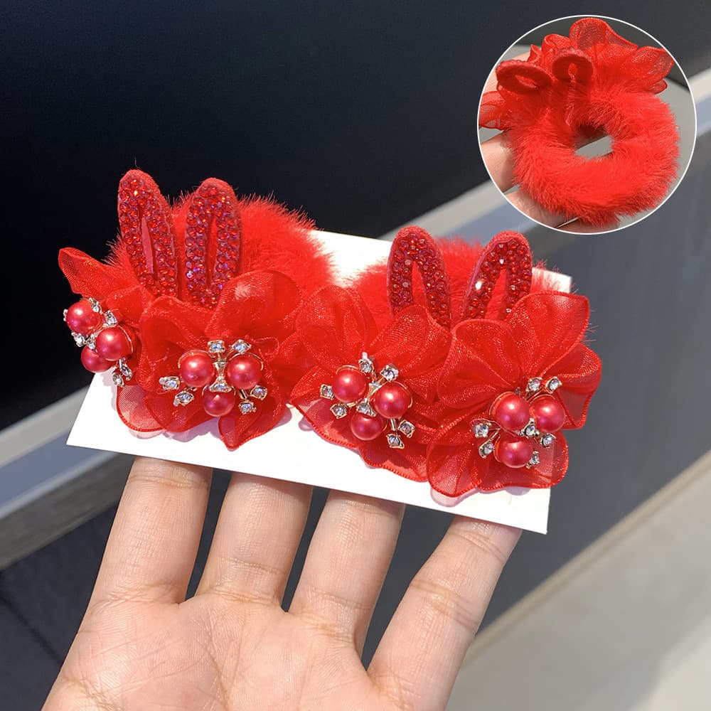 1 big red pearl hair tie