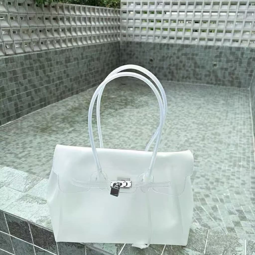 Tpu white (with key + rivets on the bottom)