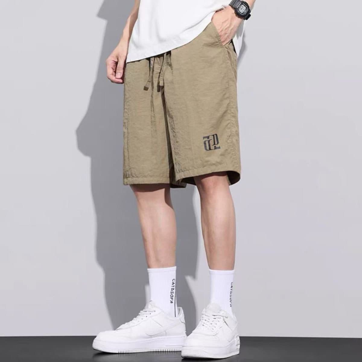X43 five-quarter pants: khaki