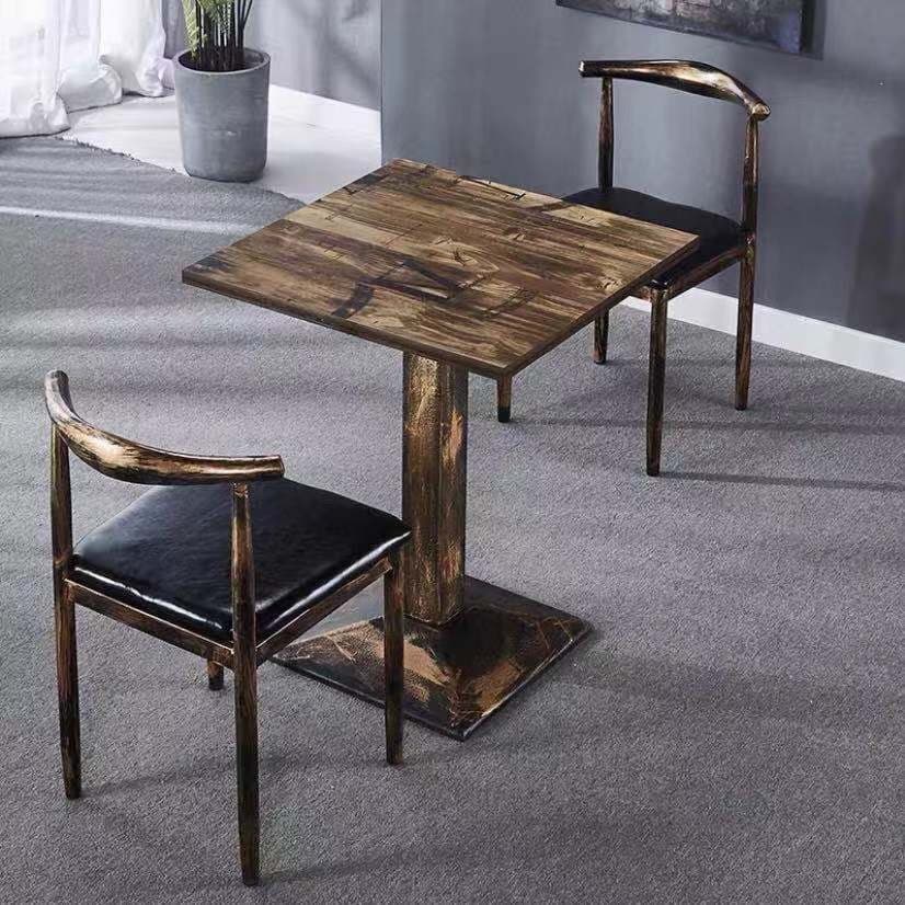 One table and two chairs [big letters]
