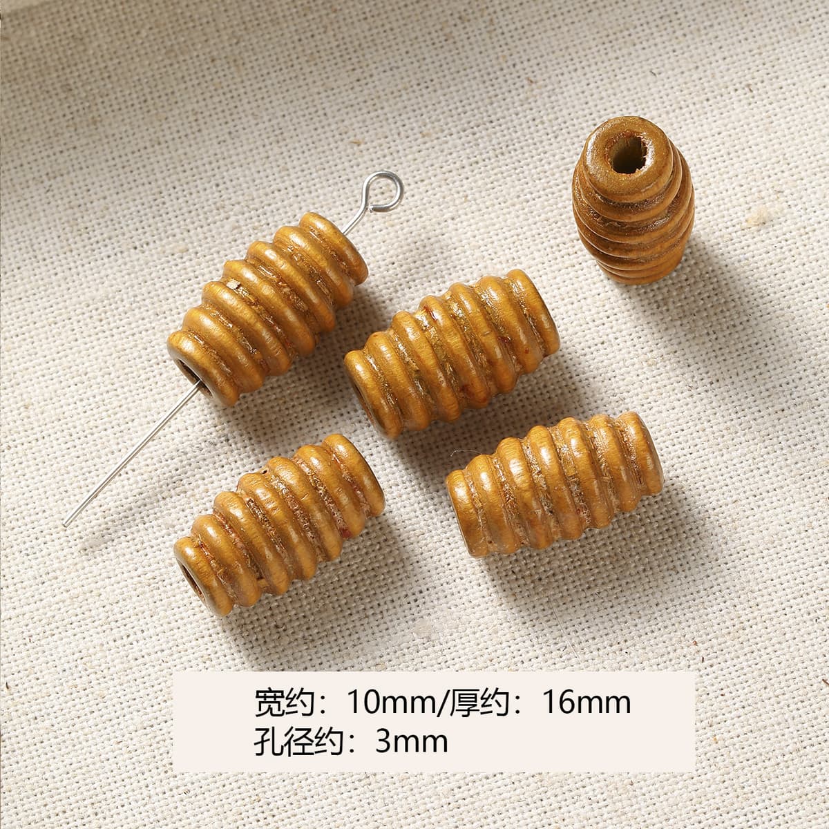 1 light brown threaded bead