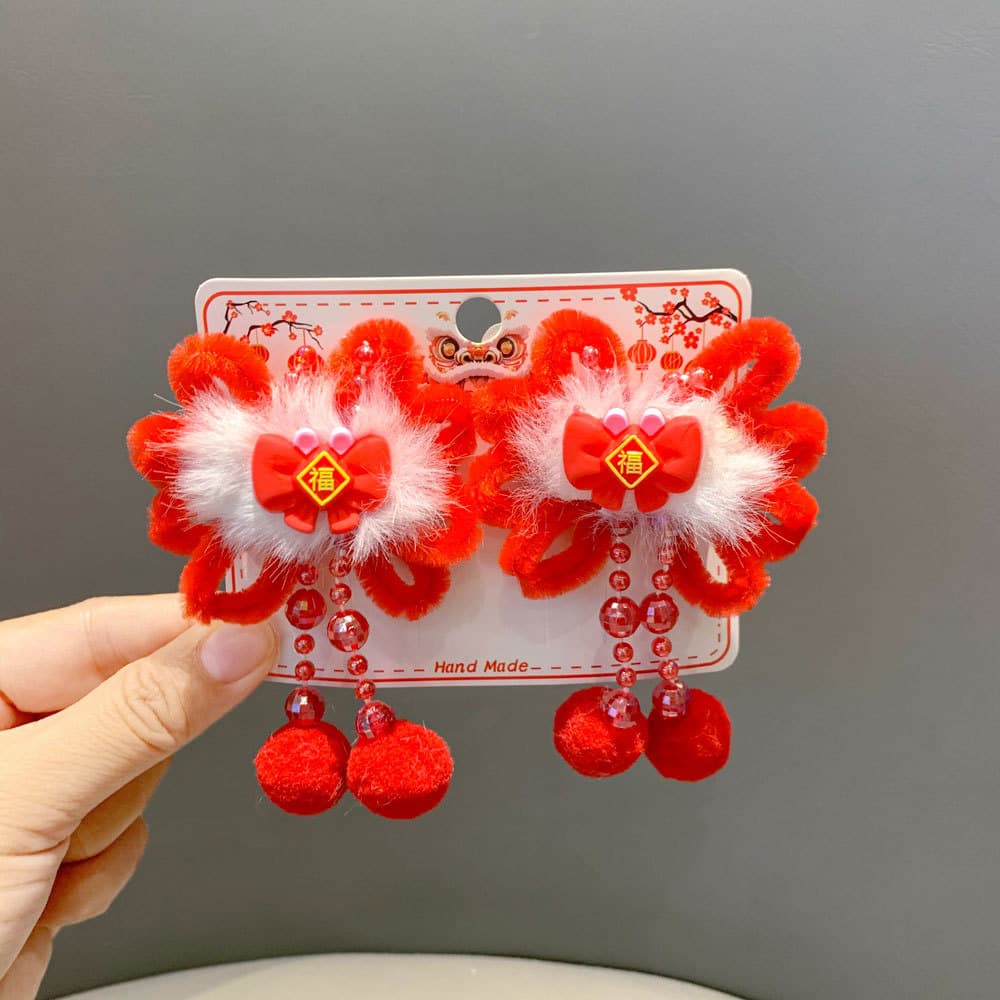 Children's red blessing solanum clip